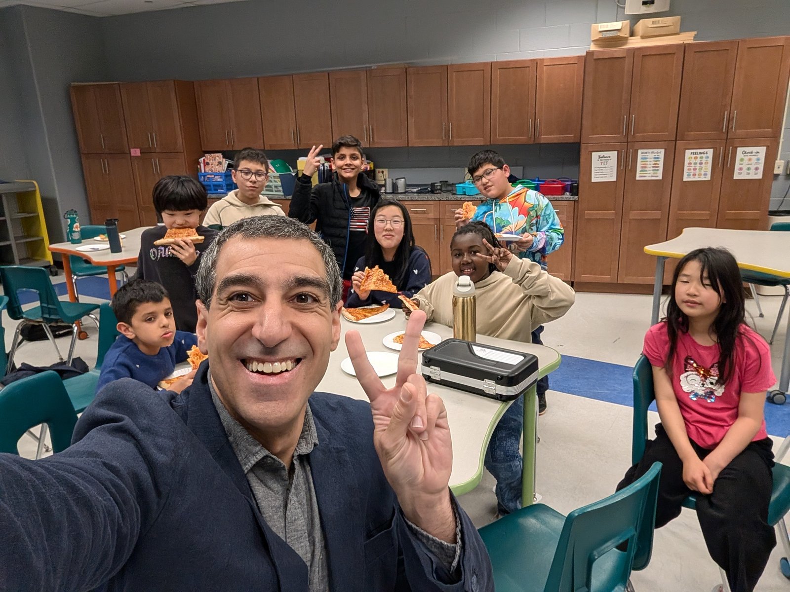 Young Speakers Academy pizza celebration during class